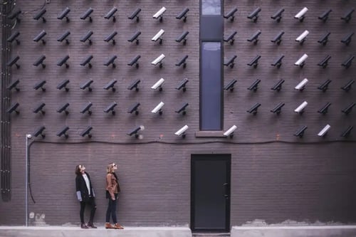 Cameras-on-Building-Facing-Two-People