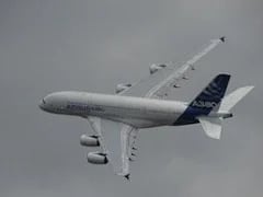 The plane in the cloudy sky