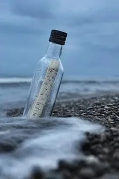 Bottle with notes in the sea (1)