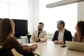 Four person discussing issue on the meeting