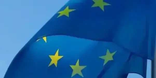 EU flag against sky 